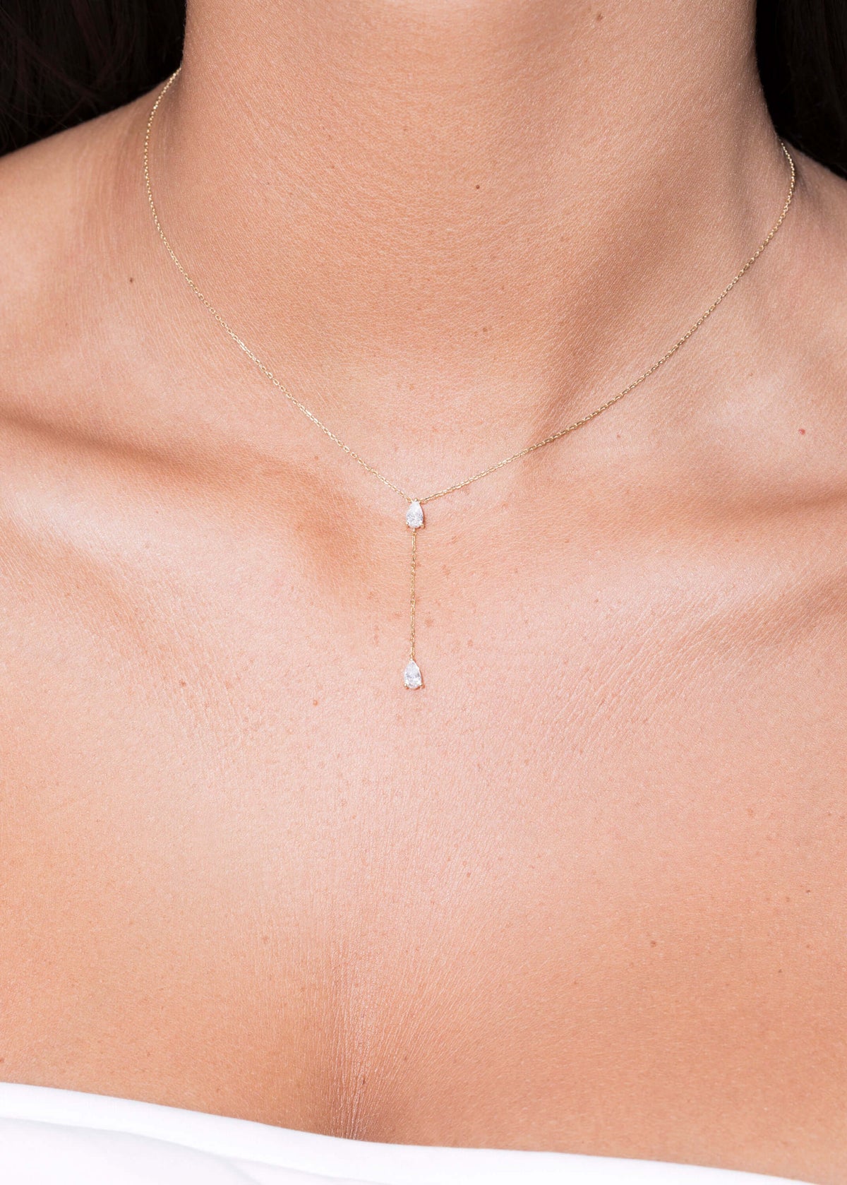 collier 18 carats avec deux diamants liés Colliers