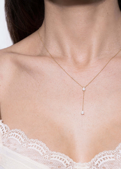 collier 18 carats avec deux diamants liés Colliers