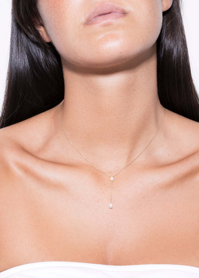 collier 18 carats avec deux diamants liés Colliers