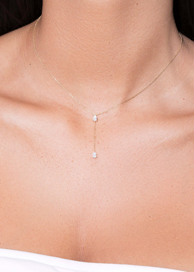 collier 18 carats avec deux diamants liés Colliers