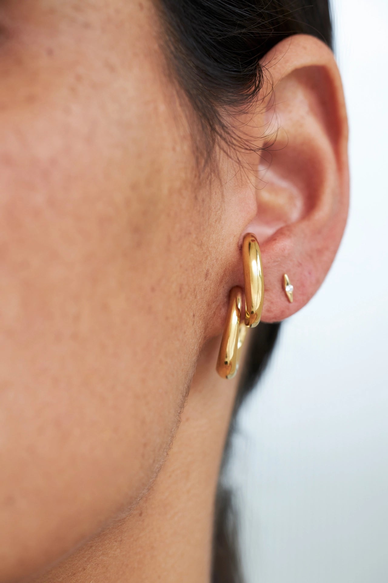Boucles d'oreilles créoles cachées Clara