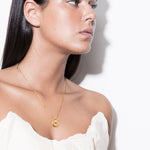 model wearing emma necklace in gold