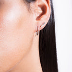 model wearing rosemere earrings and royals earrings in silver